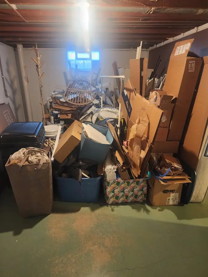 Roll-off dumpster container at job site for 4 Yard Dumpster Rental in Clever